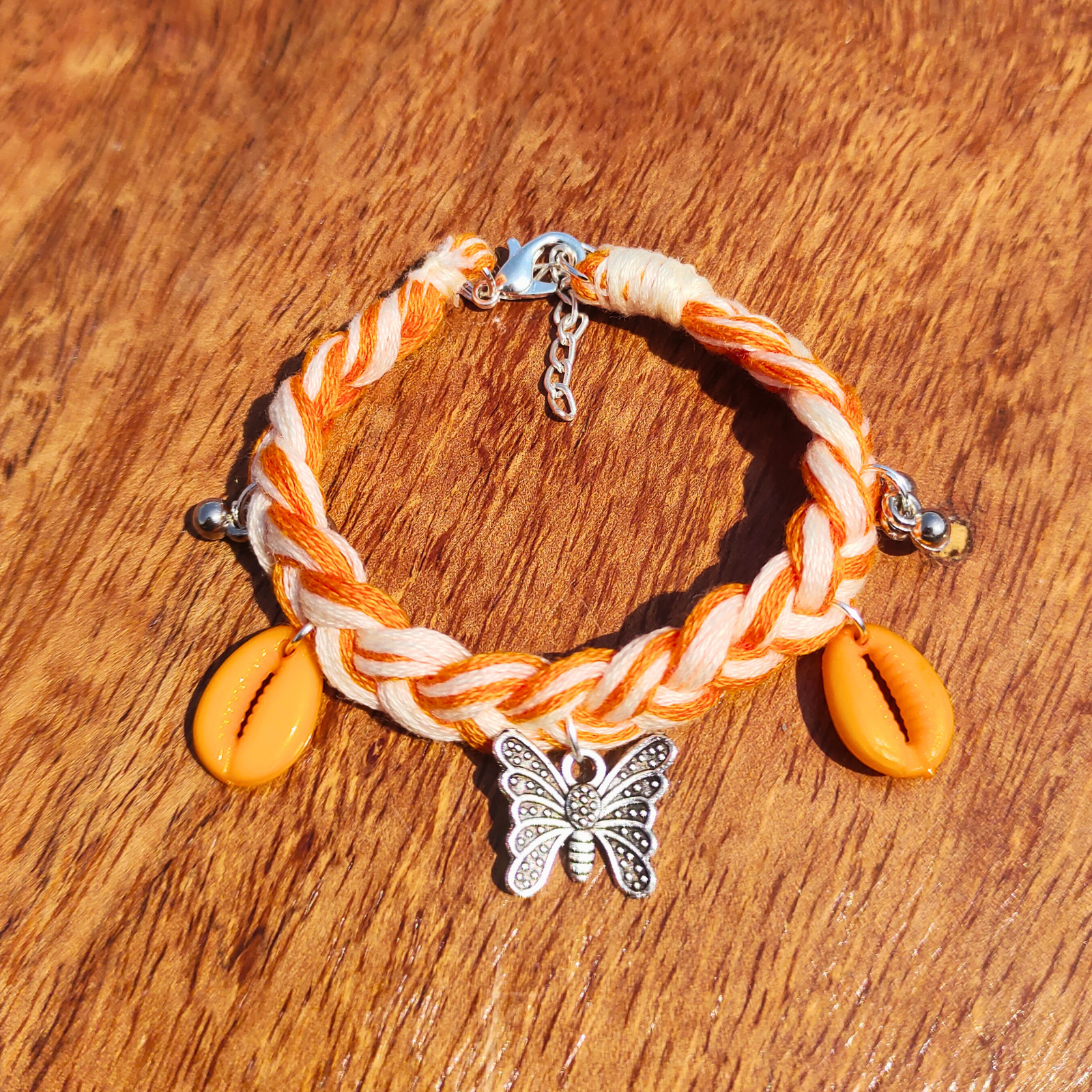 Handmade dual tone boho bracelet orange cowrie shell charm SauGaat Uttarakhand
