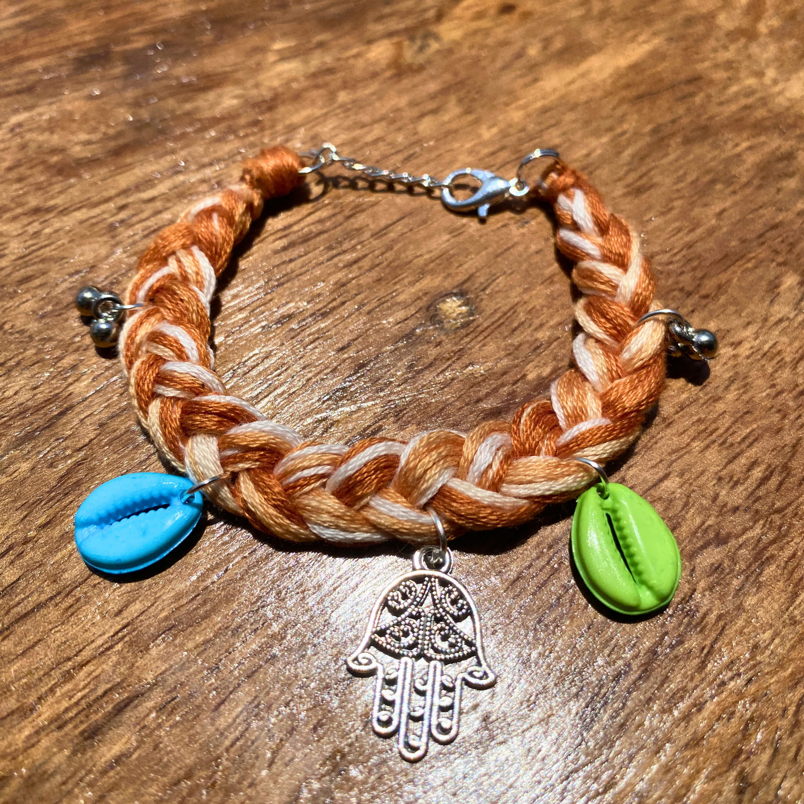 Handmade dual tone boho bracelet beige cowrie shell hamsa charm SauGaat Uttarakhand