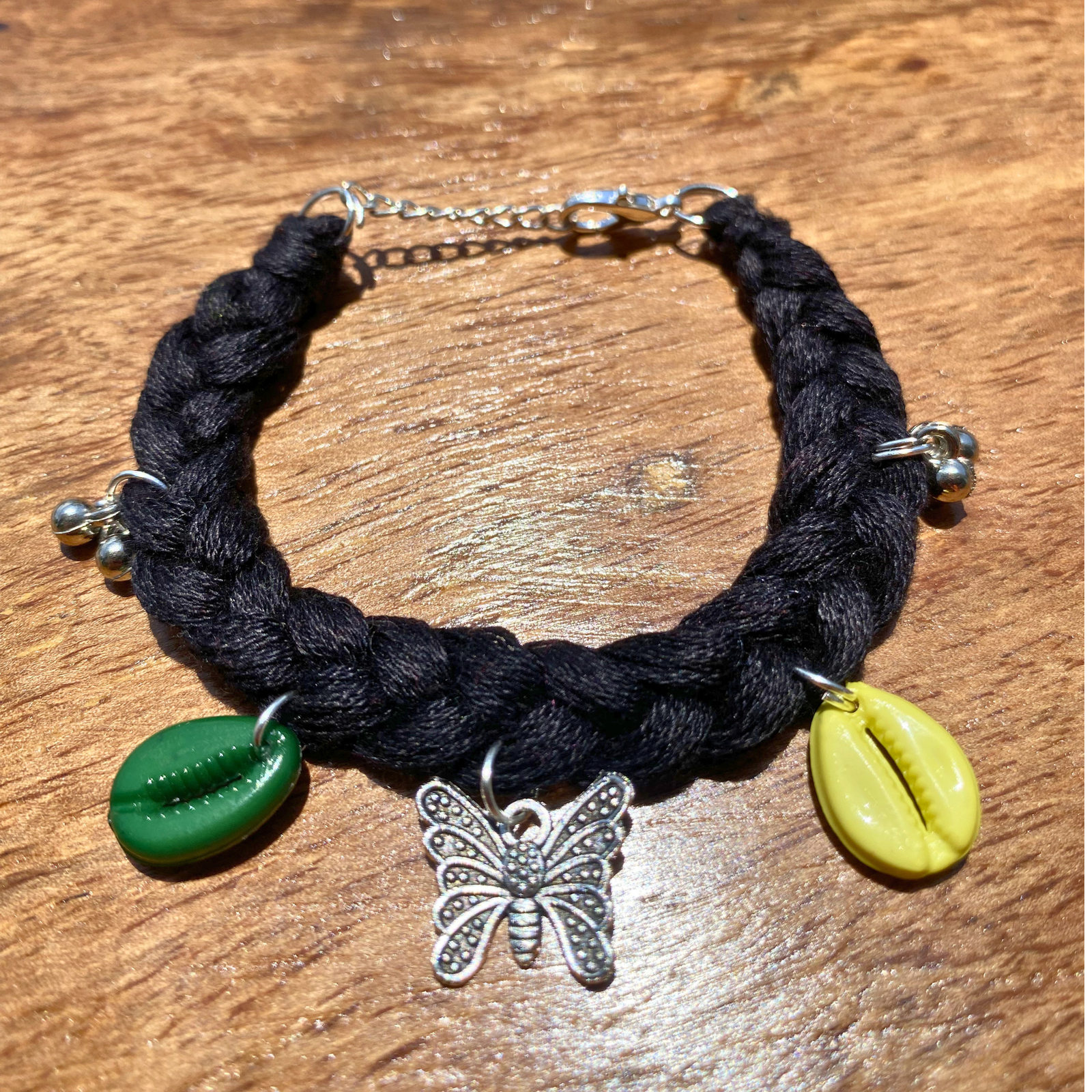 Handmade boho bracelet black cowrie shell butterfly charm SauGaat Uttarakhand