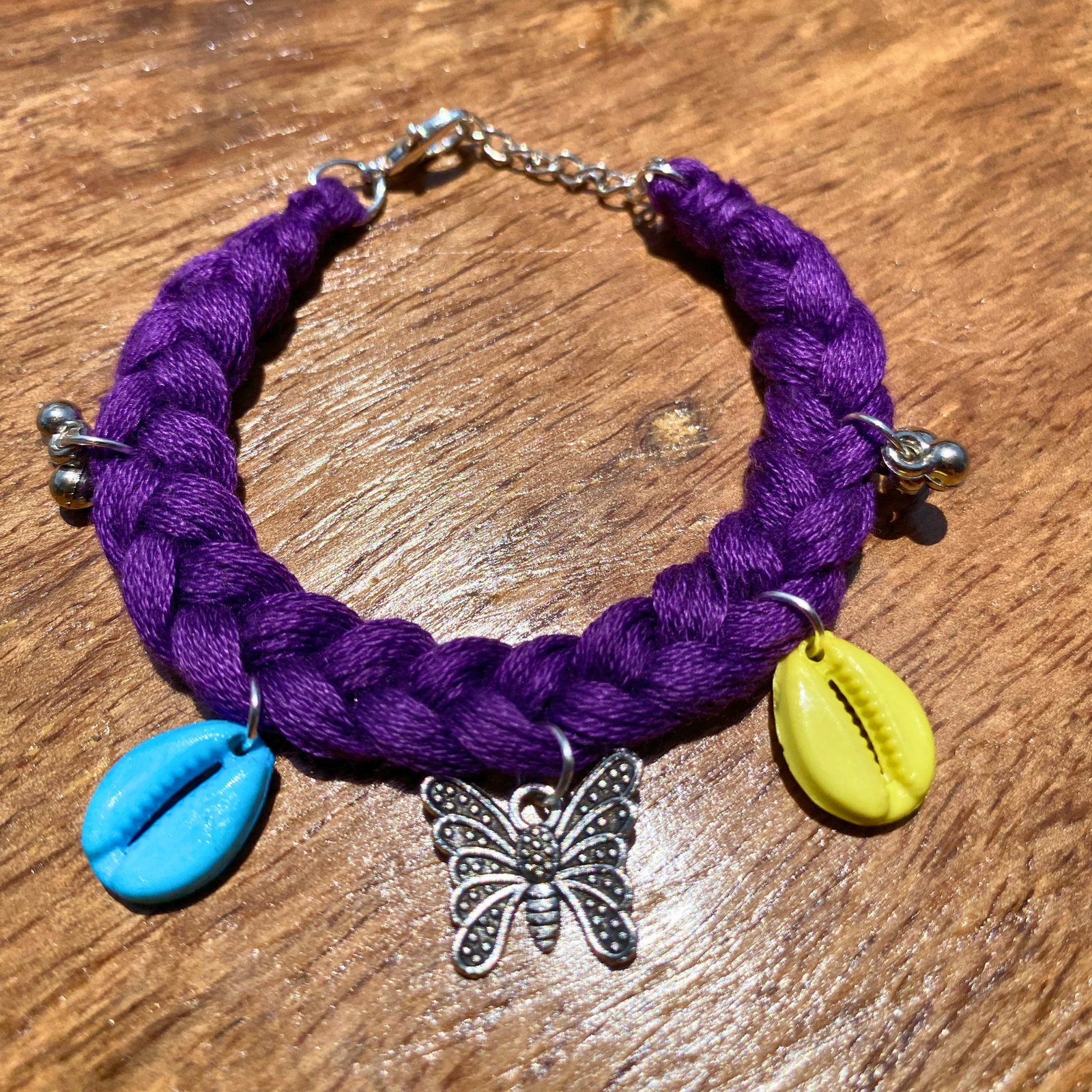 andmade boho bracelet purple cowrie shell butterfly charm SauGaat Uttarakhand