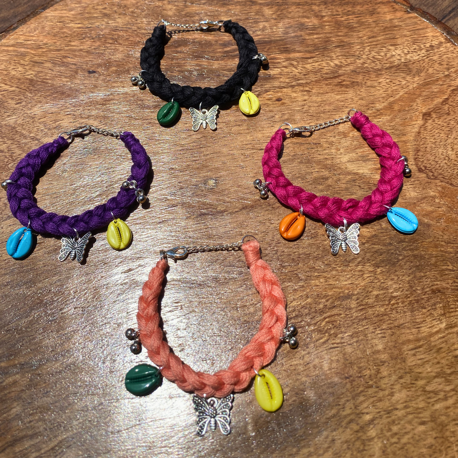 Handmade boho bracelet set of 4 black purple magenta peach cowrie shell butterfly charm by SauGaat Handmade Uttarakhand
