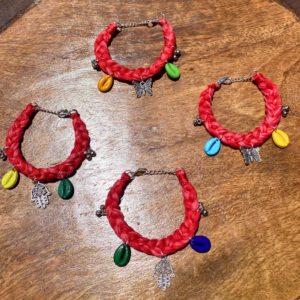 Handmade boho bracelet set of 4 ruby red cotton thread cowrie shell charm by SauGaat Handmade Uttarakhand